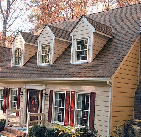 what color looks best on houses with brown metal roofs|reddish brown roof house colors.